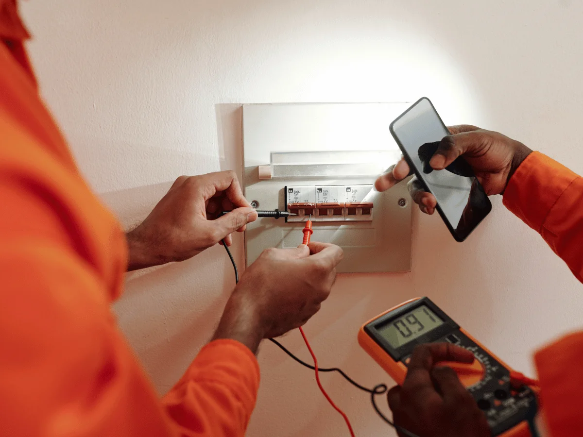 Inspecting electrical systems to ensure safety and compliance with regulations